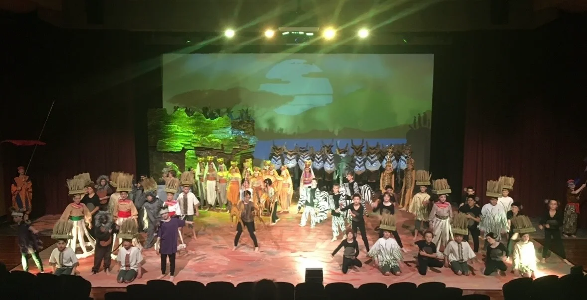 School musical performance with students on stage