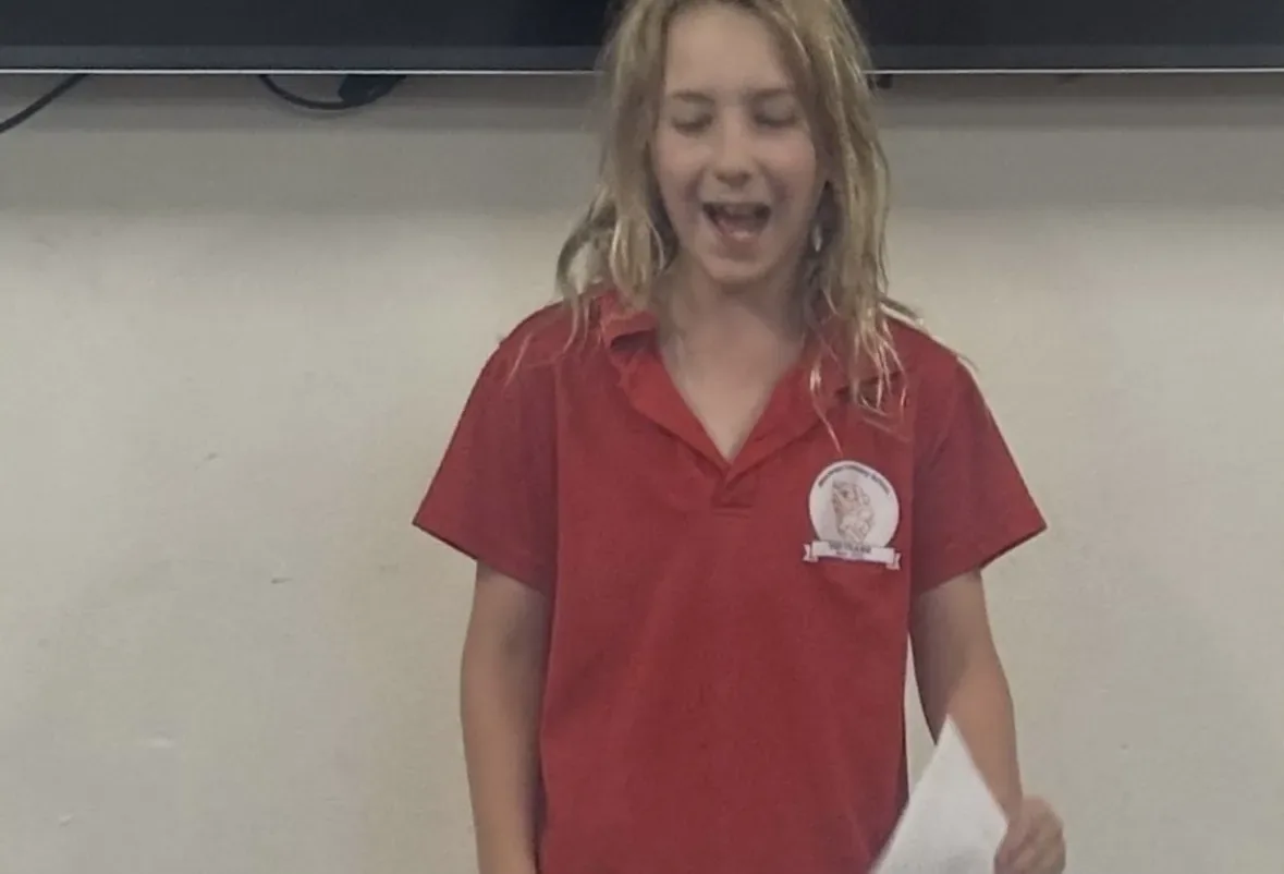 Student performing expressively during a speech and drama class at Ranges Studio