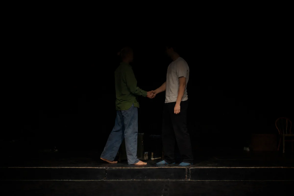 Dramatic moment between two performers in school production