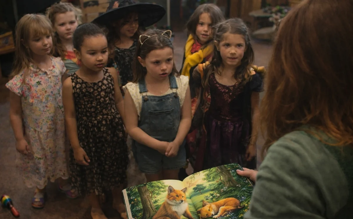 Young children making expressive faces in Tell and Show drama class
