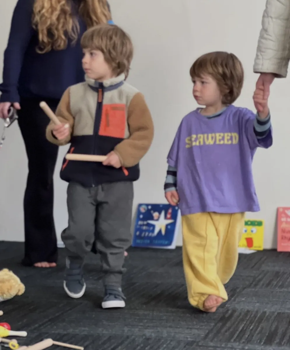 Young child during imaginative play at a Tell & Show early learners class