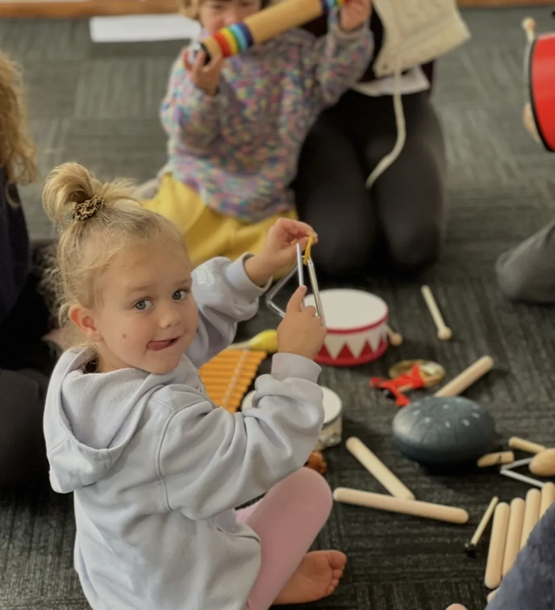 Close-up of a toddler at a Tell & Show early learners class at Ranges Studio